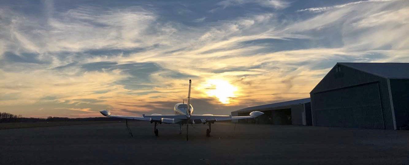 Airplane Outsite Hanger Sunset